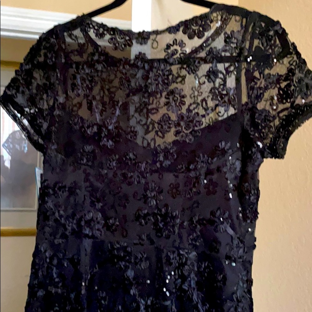 Beautiful black evening dress w/dainty handwork.